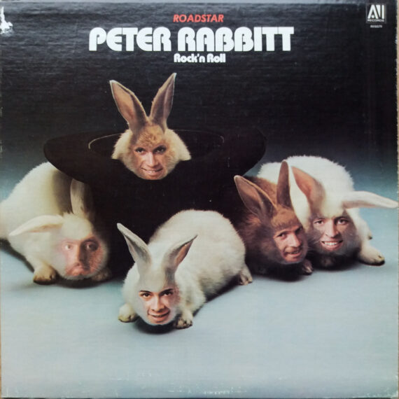 Record cover for a record called Peter Rabbitt with four white rabbits with human faces superimposed onto the rabbit's faces.